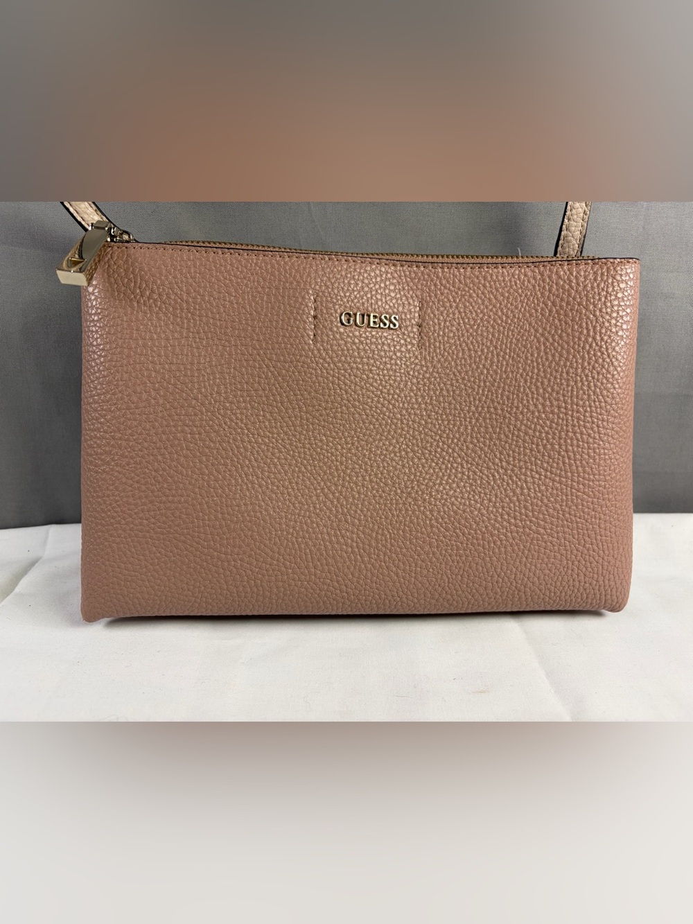 GUESS Pebbled Mauve Clutch with Gold Logo